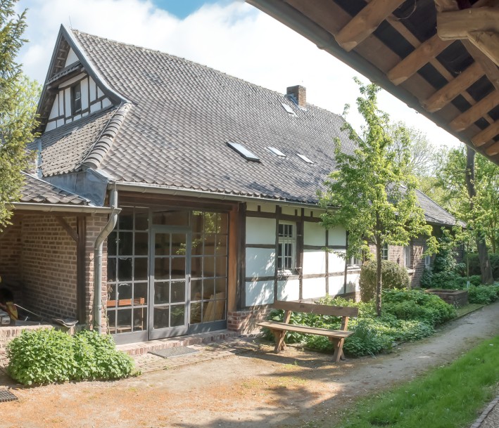 Foto: Klaus Stevens Außendarstellung des Tuppenhofes mit Fachwerk