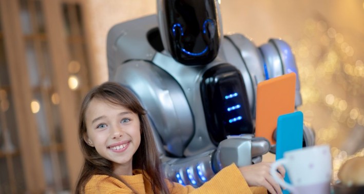 EIn Kind und ein Roboter im Lernort PhänomexX Schülerlabore, Bildungskreis Borken