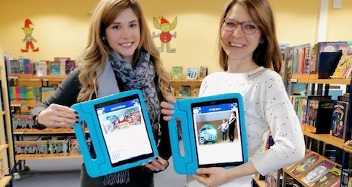 Schüler*innen mit Tablets und BIPARCOURS-App
